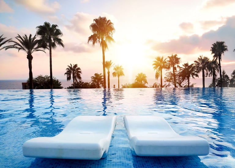 Semi olympic swimming pool with sun loungers